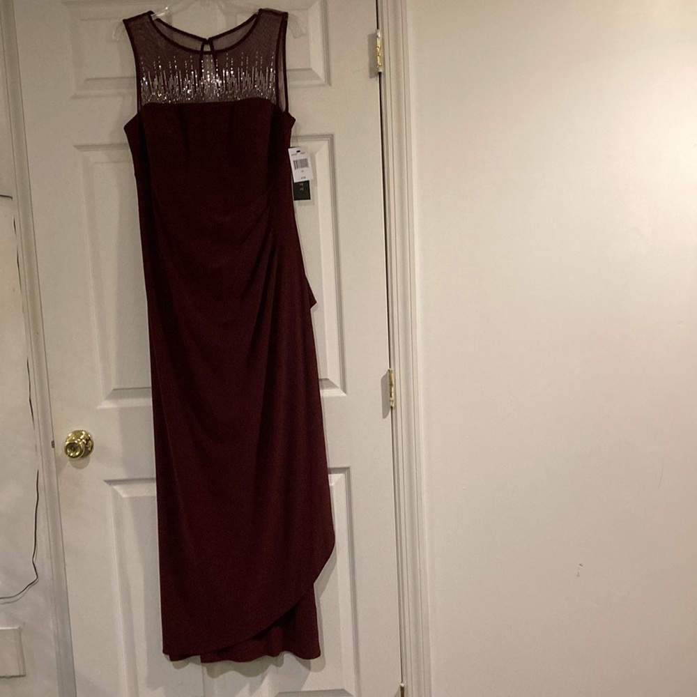 Brand new gown, size 14 color Merlot, elegant for any fancy occasion, slimming